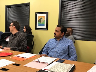 Members listen attentively.